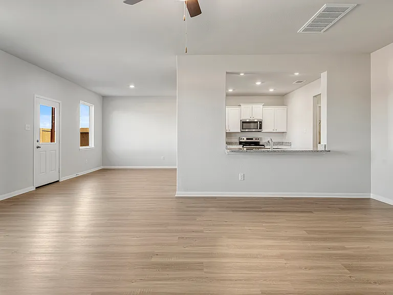 Family room, kitchen and dining room.