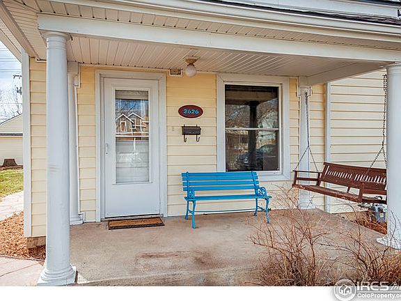 Covered front porch with swing