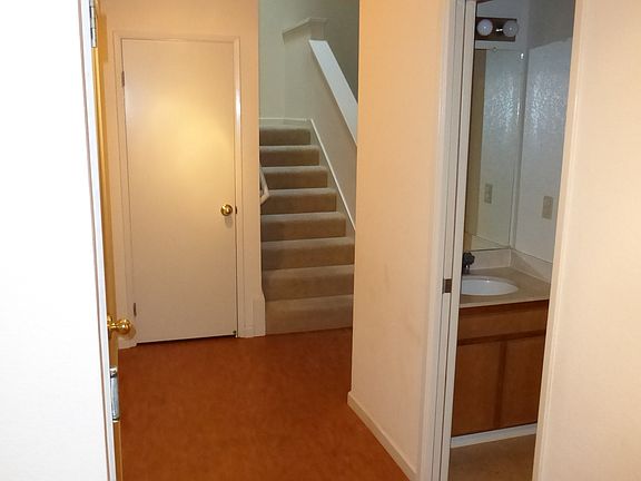 Entryway hallway and half bathroom