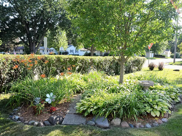 Pollinator gardens invite birds and butterflies. Over 45 different types of flowers, trees, and bushes on the property.