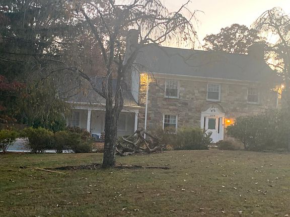 Exterior with original stone finish & new roof