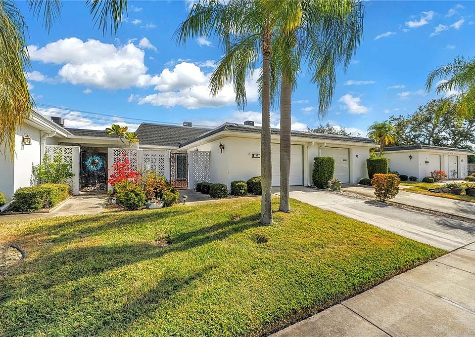 1st image of 93 BOCA CIEGA POINT BOULEVARD N #93