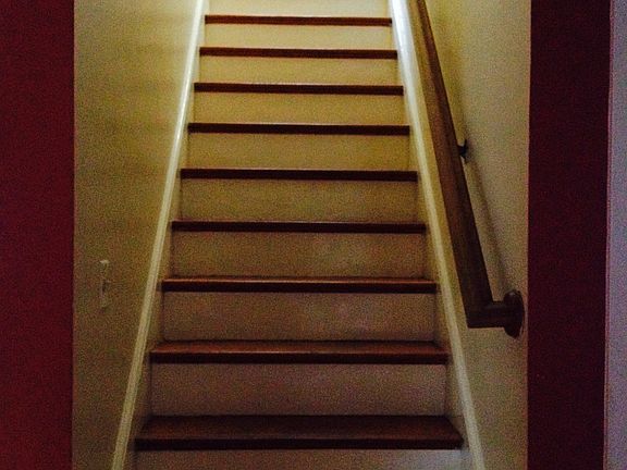 Stairwell to second floor bedrooms and bath