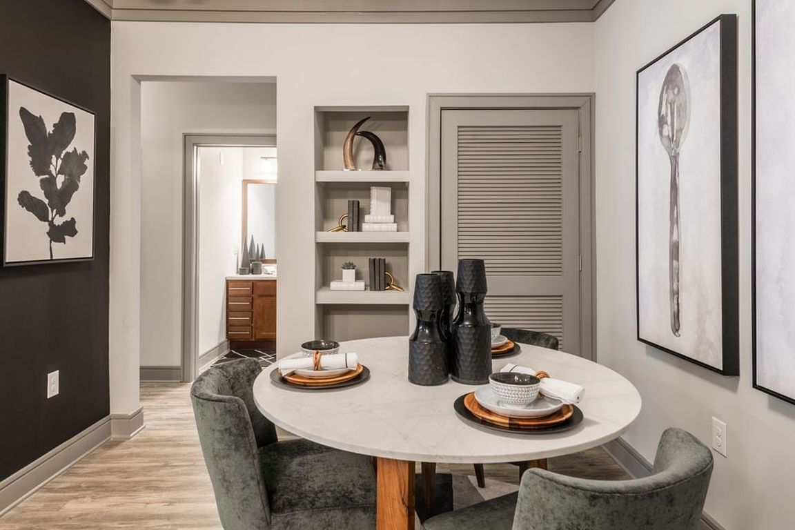 Dining area with built-in shelving