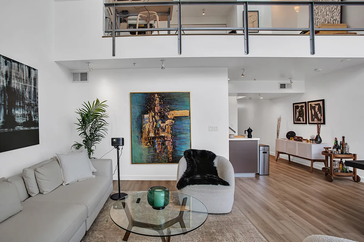 Living room view with loft above - 5806 Waring Ave #10