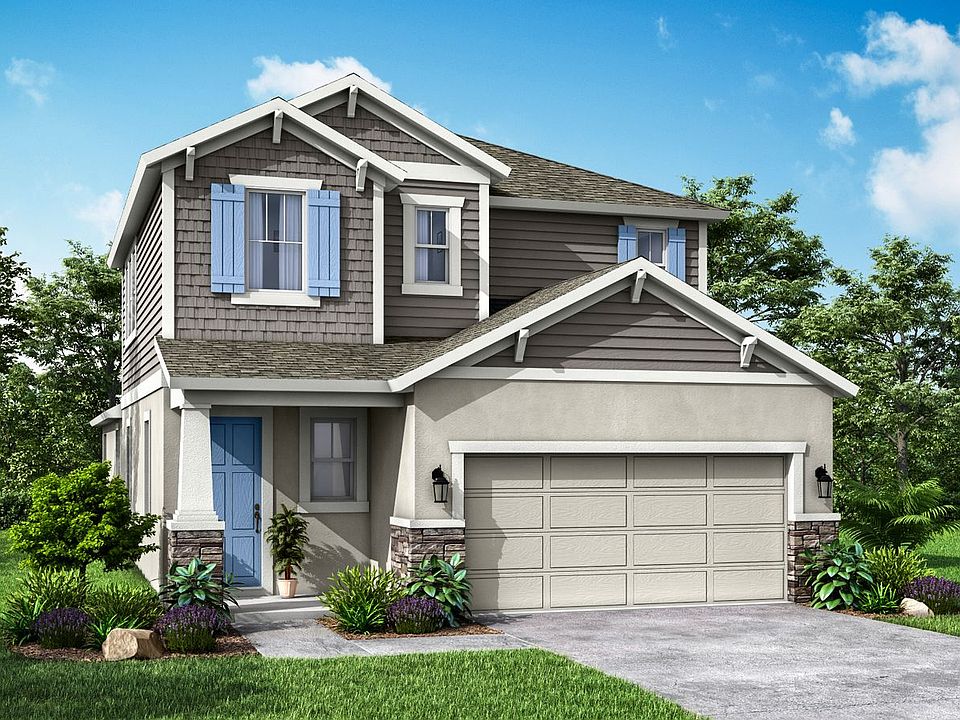Sandhill Craftsman elevation B with stone available only at BridgeWater by William Ryan Homes Tampa