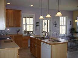 Kitchen with eat-in area and center island