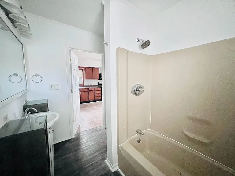 Bathroom Tub, next to the Srtackable Hookups.