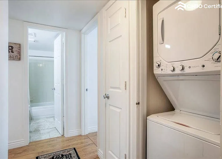 New Stacked Washer and Dryer in closet by bac