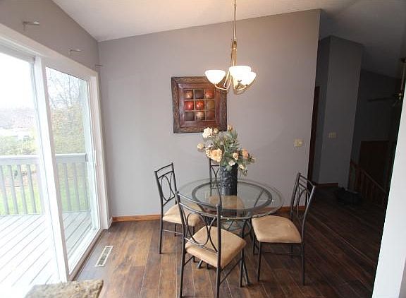 Dining area walks out to large deck.