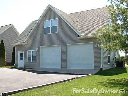 Detached 3 Bay Garage
						:
						2 car and workshop plus fully finished second floor recreation room and HVAC