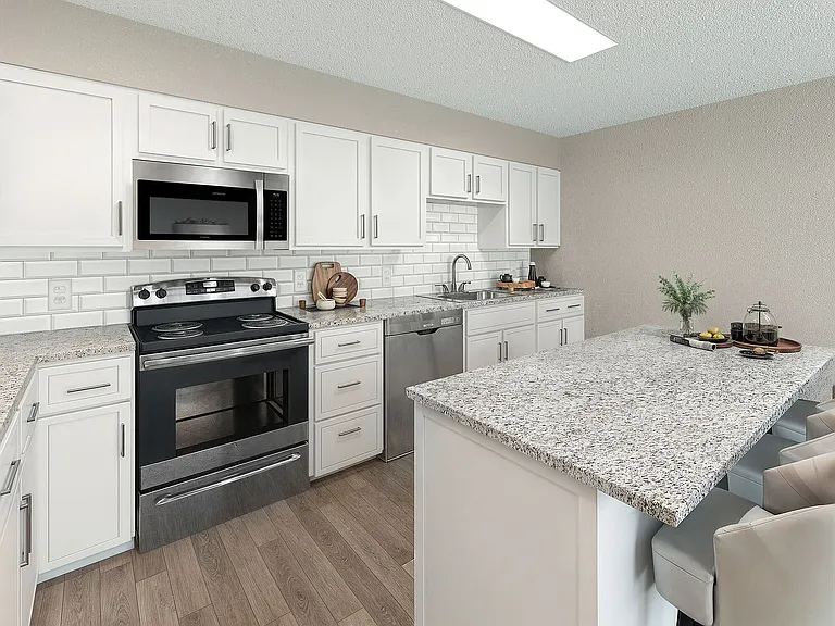 Kitchen with granite counters, stainless appliances, and modern cabinetry