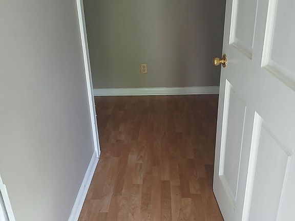 Entry. Kitchen and living room to left. Hallway at right leads to hall bath, 2 and 3rd bedrooms, master and master bath (identical to hall bath.)