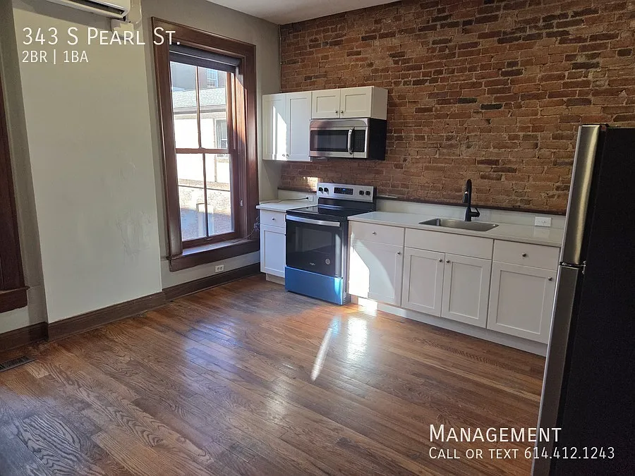 Unique Historic Downtown Living — Photo 2