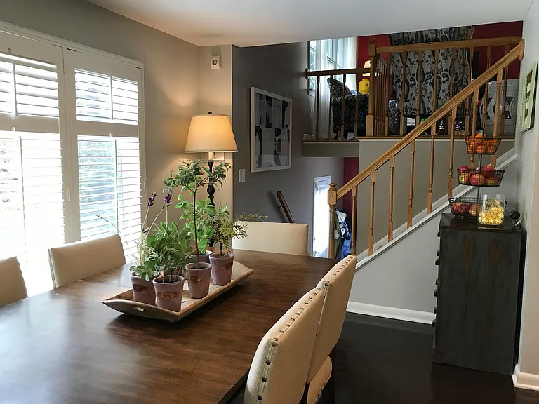 Eat-in Kitchen space...stairs leading down to Garage...