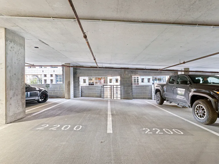 2 private gated parking spaces