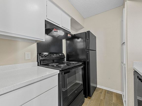 Updated kitchen with black appliances