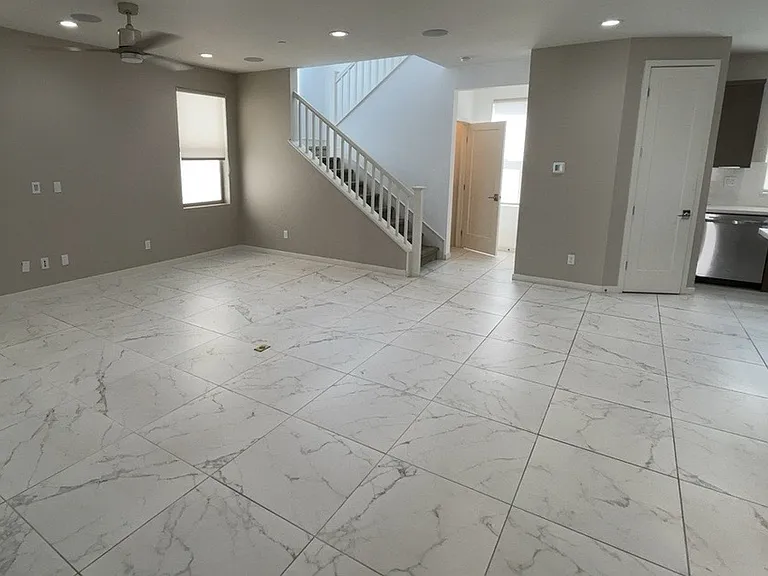 2nd floor - Great room - Kitchen, living room, under-stair storage, bathroom, balcony/patio