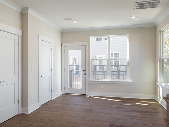 Cafe Area off of Kitchen with Door to Rear Balcony
