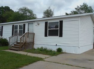 941 Elmwood Rd, Howard City, MI 49329