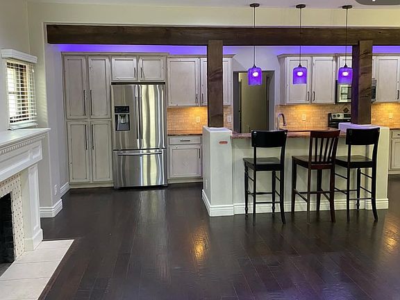 Kitchen with countertop bar