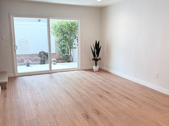 Dining area with new floors and private patio