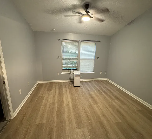 Main Bedroom with attached full bathroom and closet