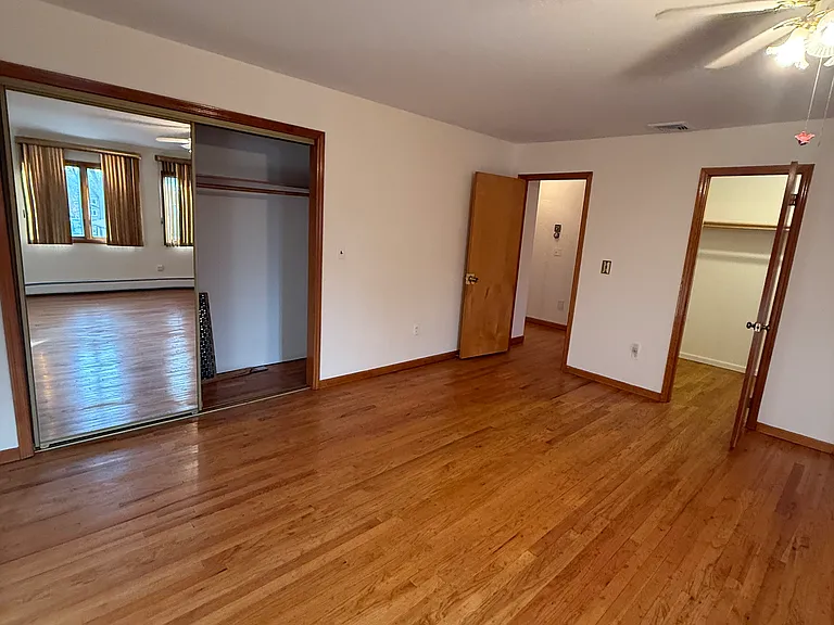 Bedroom with walk in closet