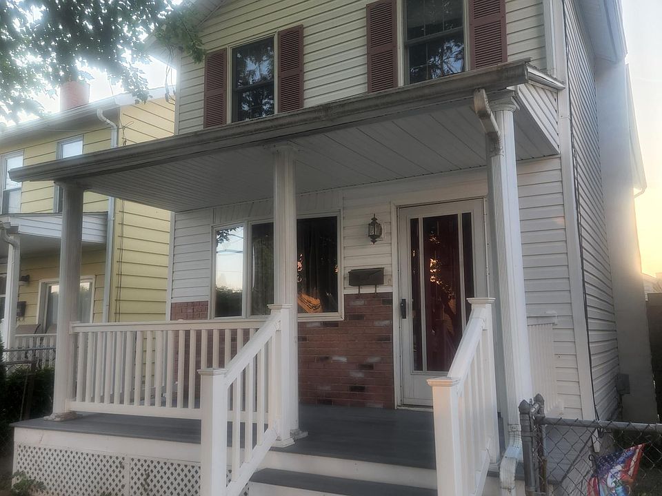 Front of house new composite decking and vinyl hand rails.