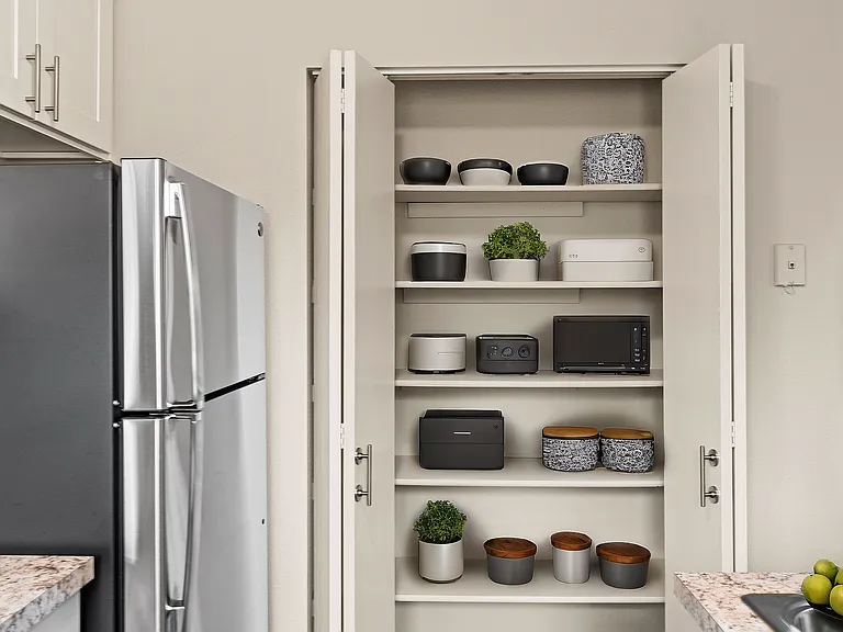 Efficient design meets style in this beautifully organized kitchen space.