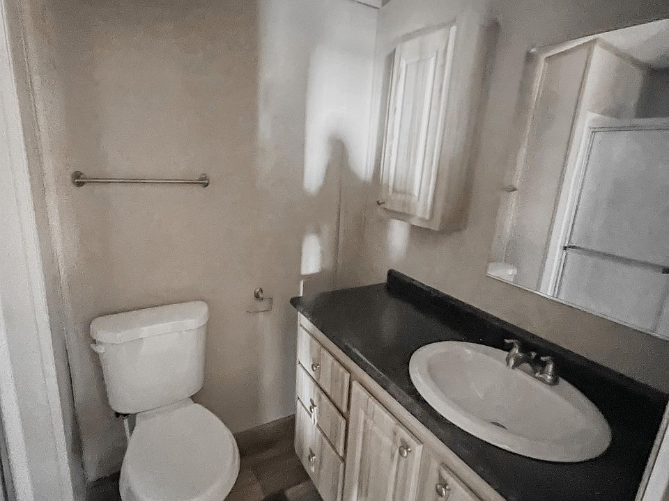 Modern ensuite bathroom with sleek finishes and a walk-in shower for everyday comfort.