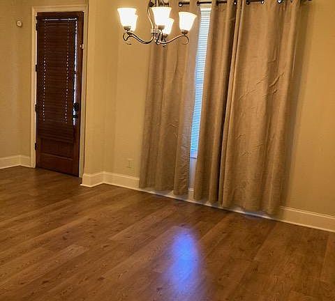 Formal Open Dining Room Front Door to the left