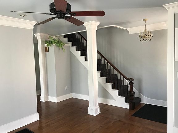 Living room, high ceilings.
