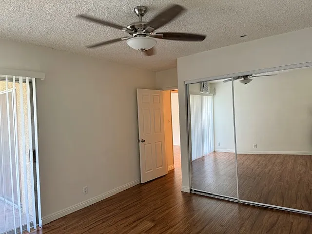 Back bedroom has sliding glass door to large balcony