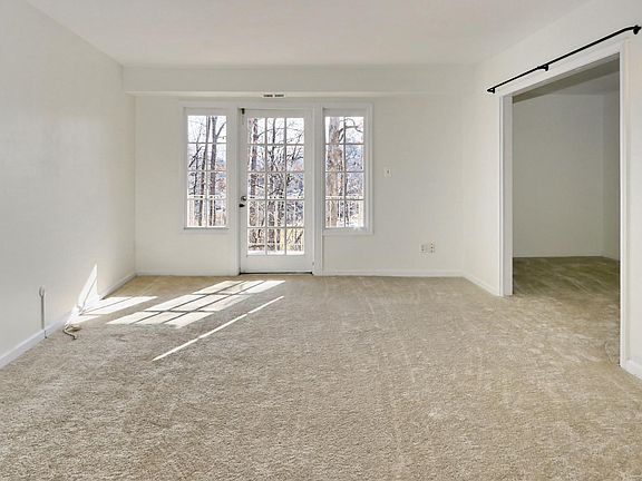 Spacious and airy! Large den/office. Brand new carpet throughout.