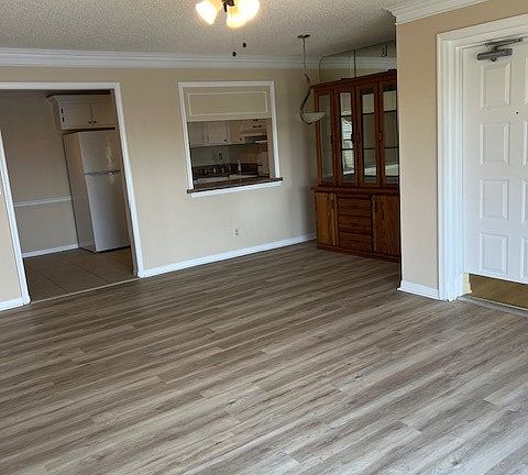 Dining room area with passthrough from kitchen