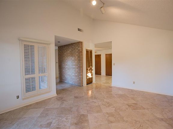 A view of the dinning room looking back towards the kitchen.