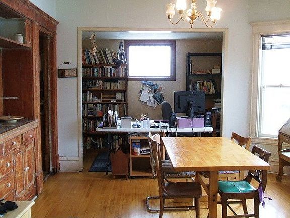 Featuring hardwood floors and a piano room