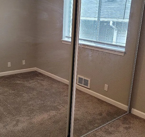 Full-Mirrored Closets Featured in both Bedrooms.