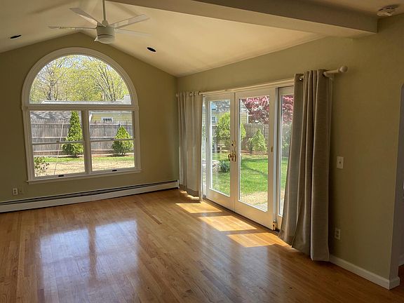 Family room with sliders to slate patio.