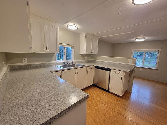 Kitchen with stainless steel appliances.