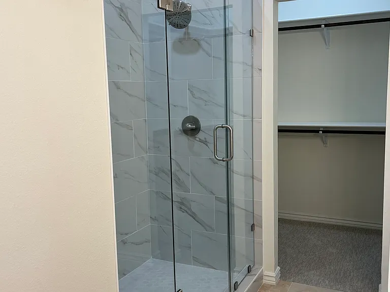 Master shower and Walking Closet
