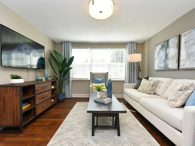 Spacious living room with hardwood-style flooring