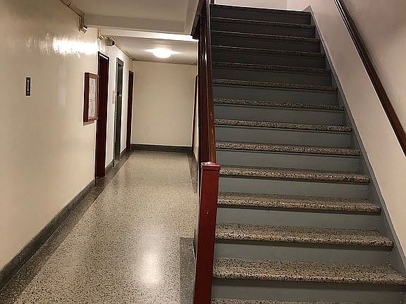 Clean hallway and stairs. 