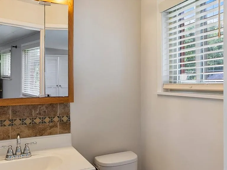 Half bath off the family room.