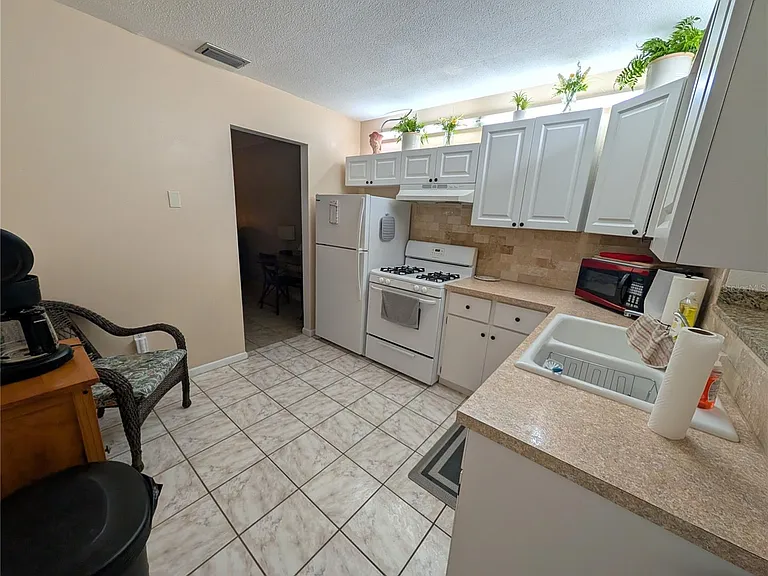 9911 Dahlia St N #38 — Photo 22