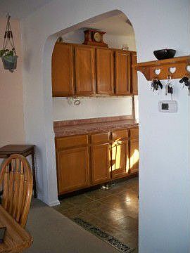 Arched Doorway To Kitchen