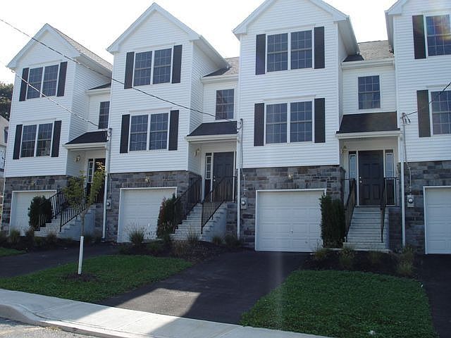 New Construction offers attached garage with off street parking