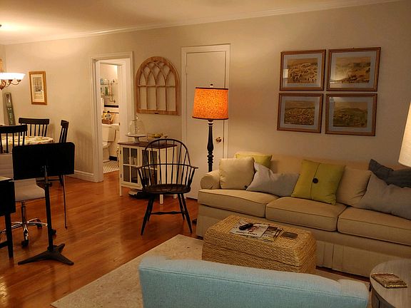 Living room. Painted in classic shades of museum grey and linen white.