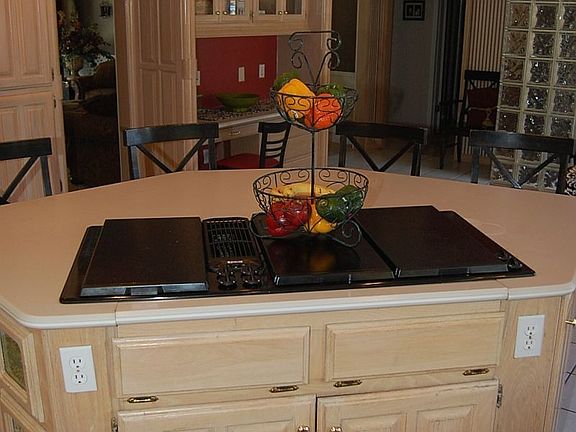 6 burner jenn aire cooktop.  Eat in island with lots of storage